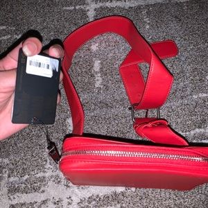 Brand new but got cuffs due to being stored with other purses